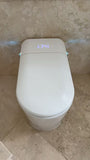 Modern toilet with digital display in a bathroom setting